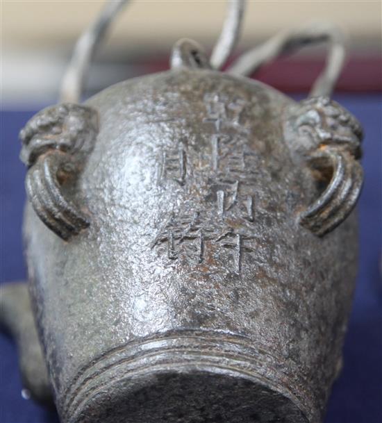 A Chinese iron temple teapot and cover, Qianlong mark and of the period, height 20cm with handles upward